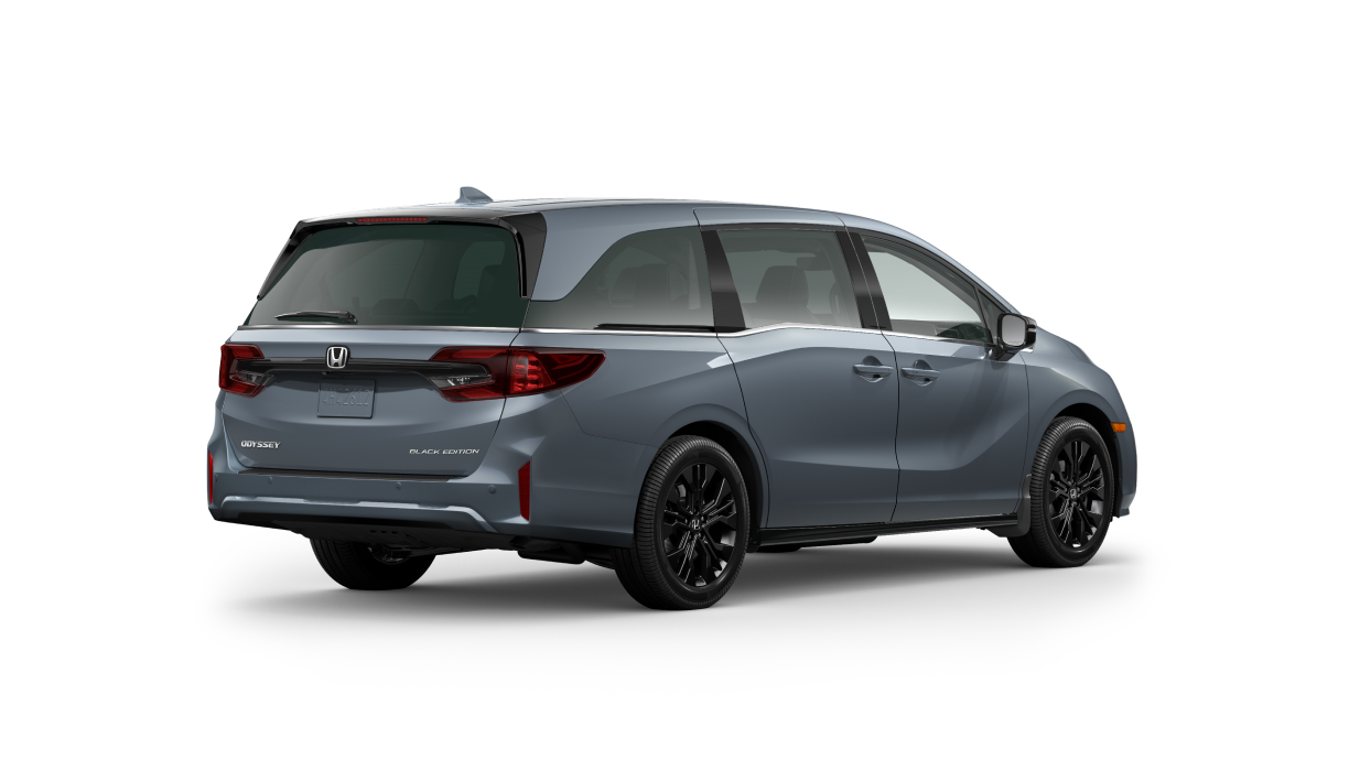3/4 back view of blueish grey Odyssey on white space.