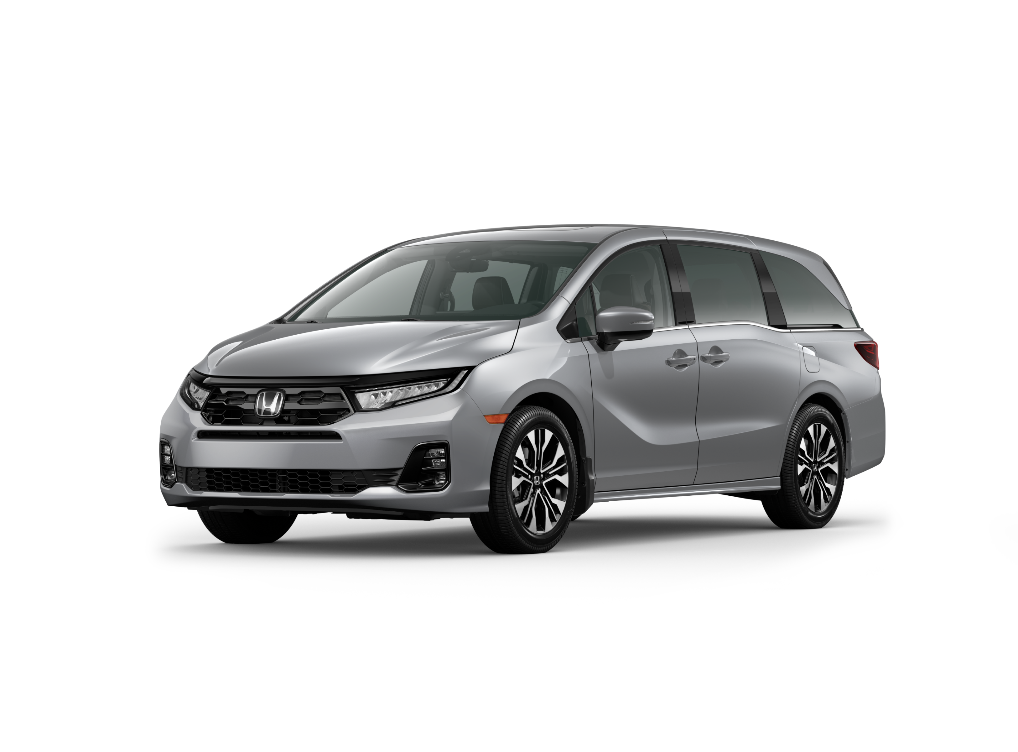 ¾ driver side front facing view of 2026 Odyssey Touring model in Solar Silver Metallic colour